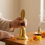 Gold Brass Finish Zinc Rudraksha Hand Bell with Feather Handle (6 Inch, 82g) (Copy) – photo 2