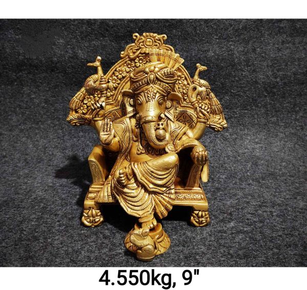 Brass Ganesh on Peacock Throne